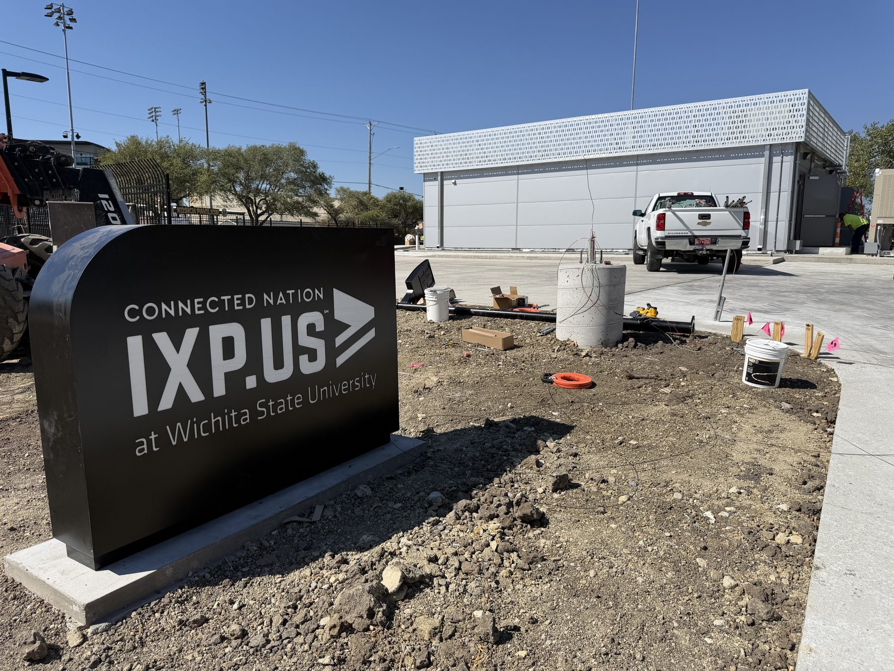 IXP.US at Wichita State University sign in front of the finished facility