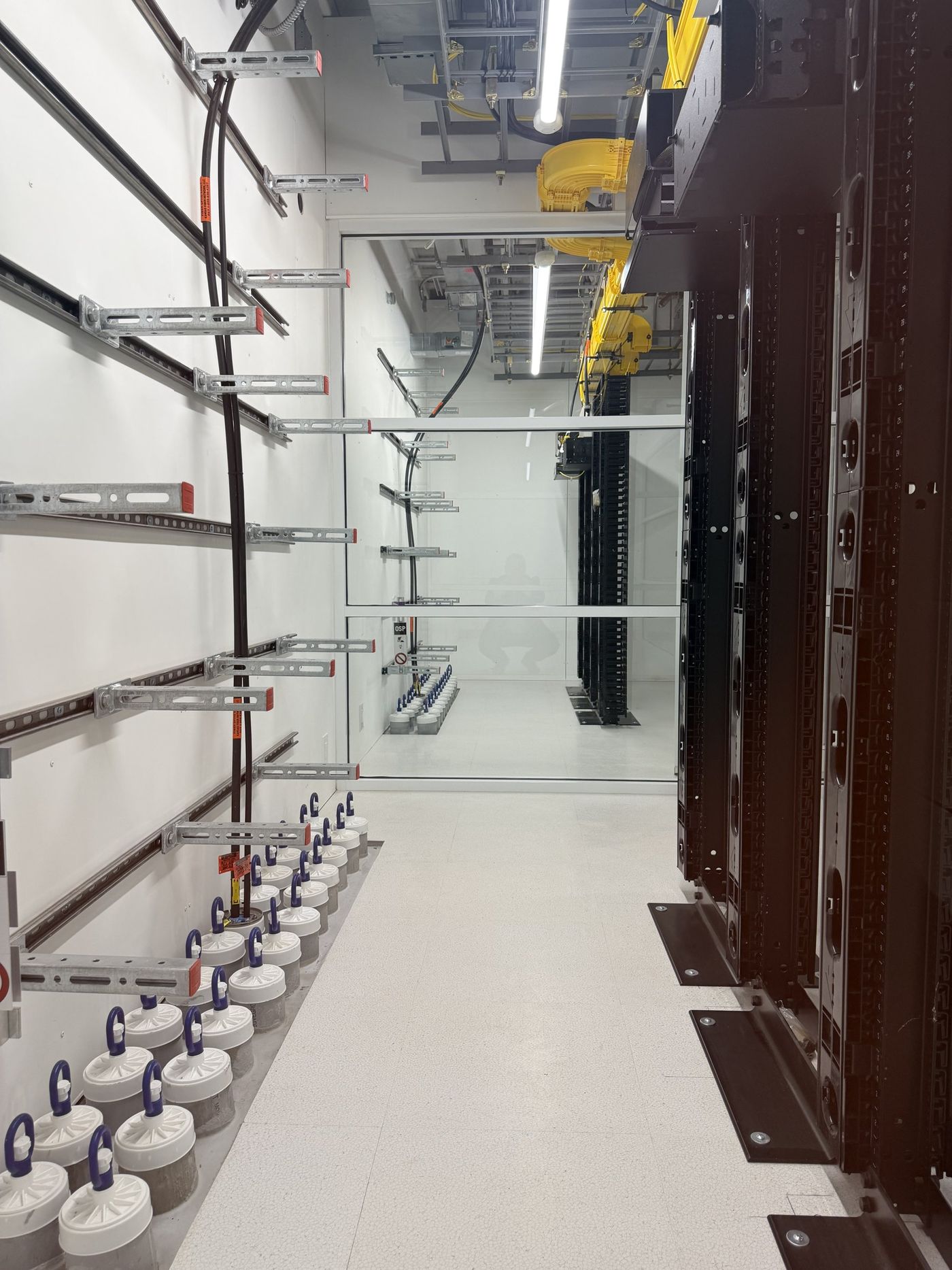 Meet Me Area with racks and overhead cable trays